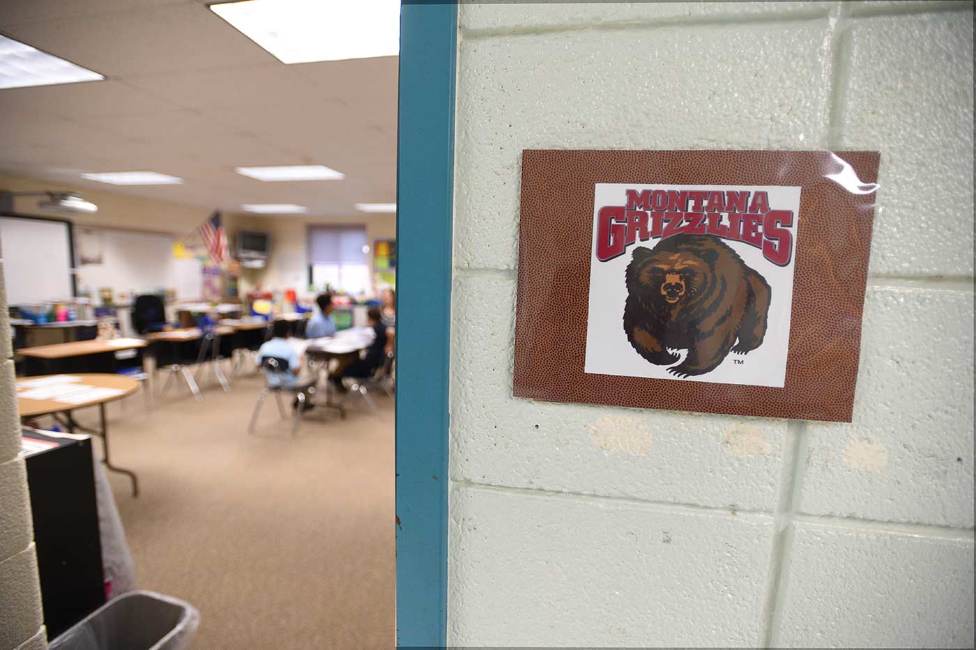 Natchaug classroom with a montana grizzlies sign outside the door